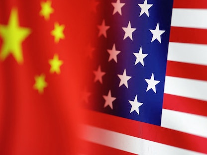 علما الولايات المتحدة والصين - REUTERS