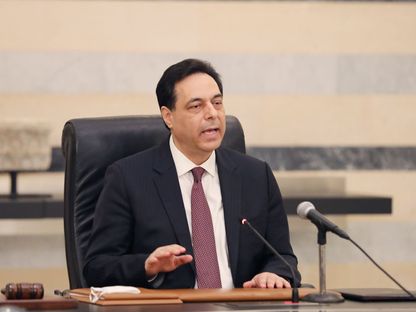 رئيس الوزراء اللبناني حسان دياب خلال مؤتمر صحافي في بيروت- 21 مايو 2020 - REUTERS