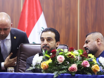 رئيس البرلمان العراقي محمد الحلبوسي (الثاني من اليمين) - REUTERS