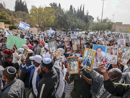 مسيرة في القدس الشرقية المحتلة تطالب إسرائيل بنقل اليهود من إثيوبيا خوفاً من الحرب، 14 نوفمبر 2021. - AFP
