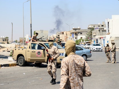جنود من كتيبة "444" ينتشرون في منطقة الاشتباكات بضاحية عين زارة في العاصمة الليبية طرابلس- – 22 يوليو 2022 - REUTERS