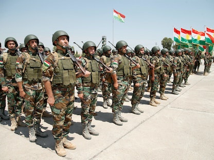 قوات البيشمركة الكردية تشارك في حفل تخرج في أحد معسكرات أربيل، 21 أغسطس 2019 - REUTERS