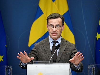 رئيس الوزراء السويدي أولف كريسترسون خلال مؤتمر صحافي حول الانضمام لـ"الناتو" في ستوكهولم. 24 يناير 2023 - via REUTERS
