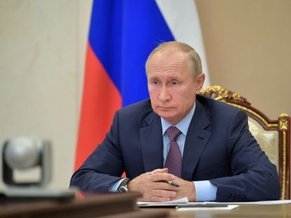 الرئيس الروسي فلاديمير بوتين خلال اجتماع حكومي بتقنية الفيديو - 14 أكتوبر 2020 - via REUTERS