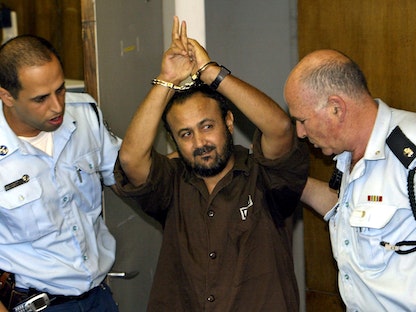 مروان البرغوثي أثناء محاكمته في إسرائيل. 20 مايو 2004. - REUTERS