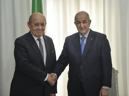 الرئيس الجزائري عبد المجيد تبون، يستقبل وزير الخارجية الفرنسي جان إيف لودريان في العاصمة الجزائر - 21 يناير 2020 - AFP
