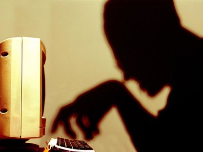 صورة تعبيرية لأحد قراصنة الإنترنت، 23 مايو 2002 - Getty