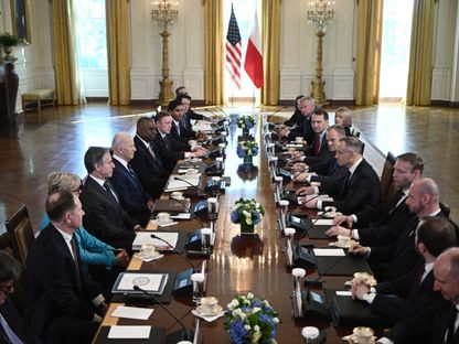 الرئيس الأميركي جو بايدن يجتمع مع رئيس الوزراء البولندي دونالد توسك في واشنطن. 12 مارس 2024 - AFP