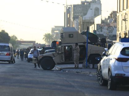 انتشار لقوات الأمن في منطقة الجادرية بالعاصمة العراقية بغداد. 4 يونيو 2024 - Arab World Press (AWP)