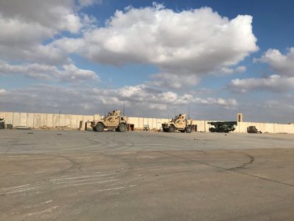 صورة تظهر آليات عسكرية داخل قاعدة "عين الأسد" غرب العراق. 18 أكتوبر 2023 - Reuters