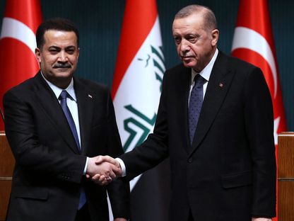 الرئيس التركي رجب طيب أردوغان ورئيس الوزراء العراقي محمد شياع السوداني بعد اجتماعهما في القصر الرئاسي في أنقرة. 21 مارس 2023 - AFP