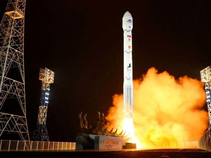 صاروخ يحمل القمر الصناعي ماليجيونج-1 المخصص لأغراض التجسس إلى مداره. شمال جيونجسانج، كوريا الشمالية. 21 نوفمبر 2023 - Reuters