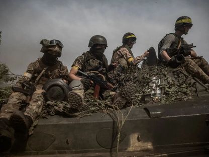 جنود أوكرانيون بالقرب من سيفيرودونيتسك خلال الأسبوع الأول من شهر يونيو  - Finbarr O'Reilly for The New York Times