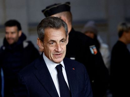 الرئيس الفرنسي السابق نيكولا ساركوزي يصل إلى محكمة في باريس لمحاكمته بتهم الفساد واستغلال النفوذ. 15 ديسمبر 2022 - REUTERS