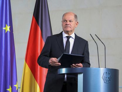 المستشار الألماني أولاف شولتز يتحدث عن الوضع في إسرائيل خلال كلمة في مقر المستشارية في برلين. 08 أكتوبر 2023 - Reuters