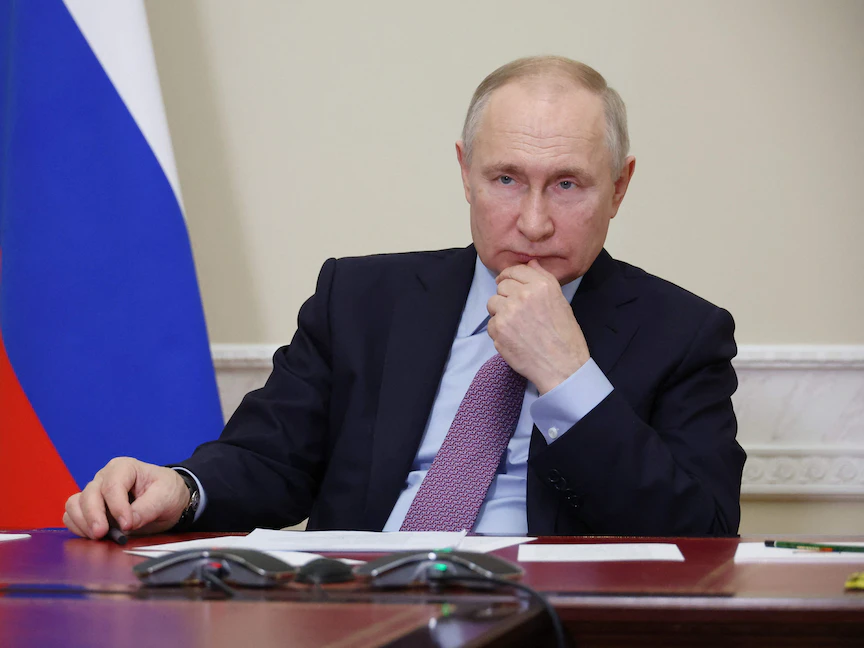 الرئيس الروسي فلاديمير بوتين يحضر بتنقية الفيديو حفل إطلاق مجمع Titan-Polymer الصناعي في سانت بطرسبرغ. 28 ديسمبر 2022 - AFP