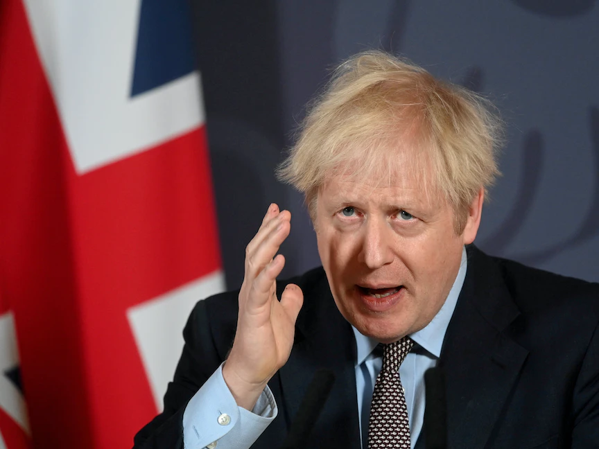 رئيس الوزراء البريطاني بوريس جونسون خلال مؤتمر صحافي في لندن - 24 ديسمبر 2020 - REUTERS