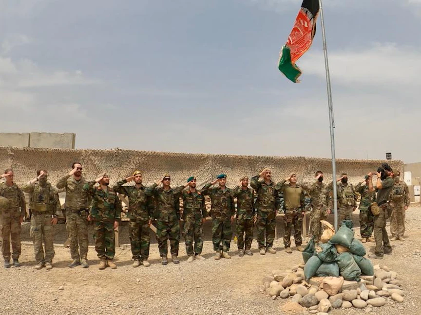 مراسم تسليم معسكر أنطوني من الجيش الأميركي إلى قوات الدفاع الأفغانية في ولاية هلمند - REUTERS