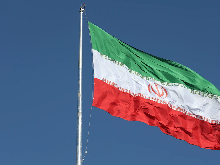 العلم الإيراني يرفرف فوق شارع في طهران- 3 فبراير 2023. - via REUTERS