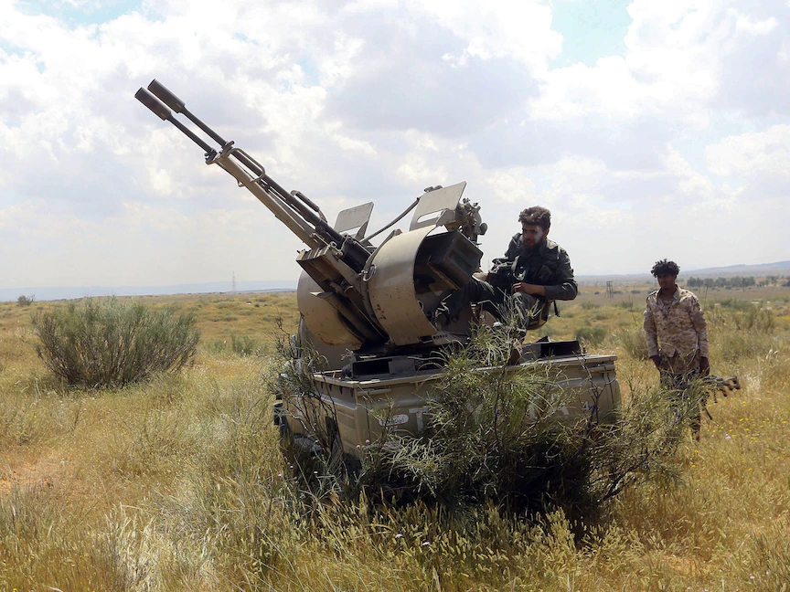 عناصر من الجماعات المسلحة المتحالفة مع حكومة المجلس الرئاسي بقيادة فايز السراج - AFP