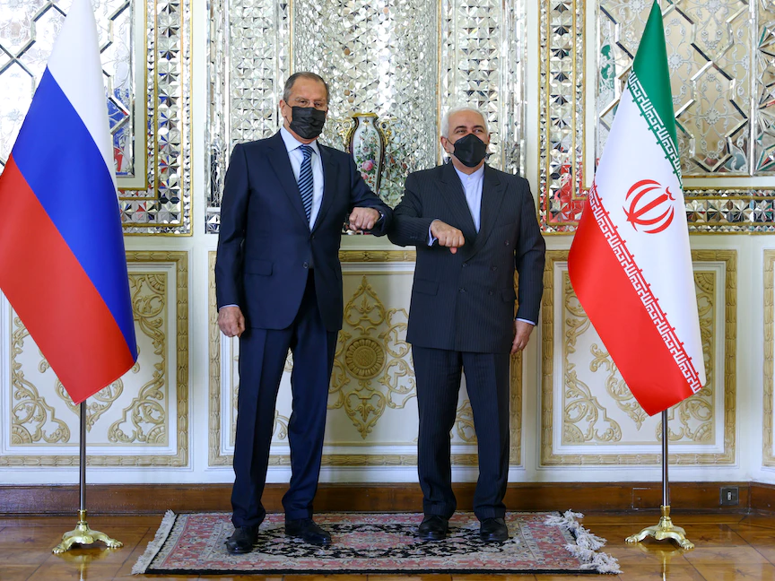 Russian Foreign Minister Sergei Lavrov and Iranian Foreign Minister Mohammad Javad Zarif hold a meeting in Tehran on April 13, 2021. (Photo by Handout / RUSSIAN FOREIGN MINISTRY / AFP) / RESTRICTED TO EDITORIAL USE - MANDATORY CREDIT "AFP PHOTO / Russian Foreign Ministry / handout " - NO MARKETING - NO ADVERTISING CAMPAIGNS - DISTRIBUTED AS A SERVICE TO CLIENTS - AFP