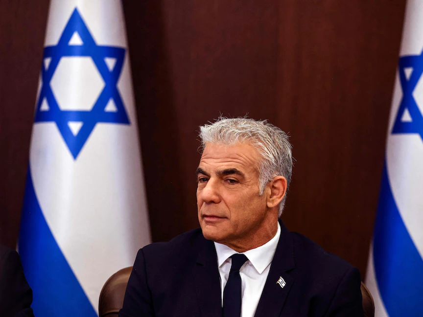 رئيس الوزراء الإسرائيلي يائير لبيد يحضر الجلسة الأسبوعية للحكومة في القدس- 11 سبتمبر 2022 - AFP