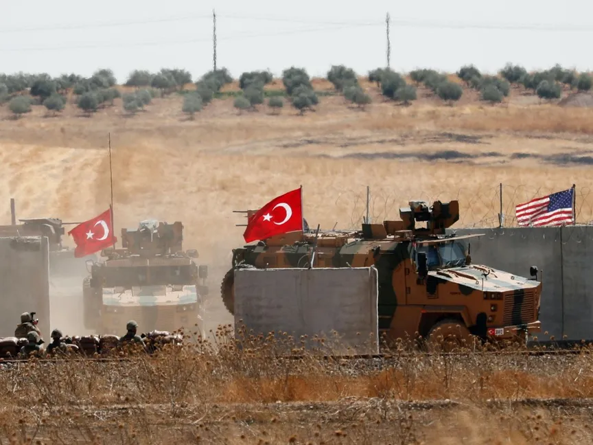 قوات تركية وقوات أميركية خلال دورية مشتركة شمال سوريا- 8 سبتمبر 2019 - REUTERS