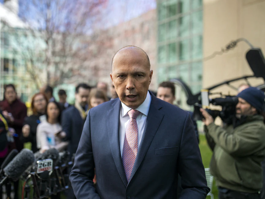 وزير الدفاع الأسترالي بيتر داتون خلال مؤتمر صحافي في كانبرا.21 أغسطس 2018 - AFP