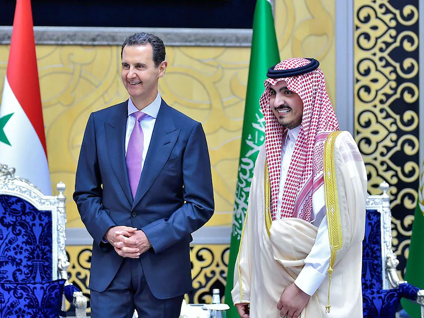 الأمير بدر بن سلطان بن عبد العزيز نائب أمير منطقة مكة يستقبل الرئيس السوري بشار الأسد في جدة. 18 مايو 2023 - AFP