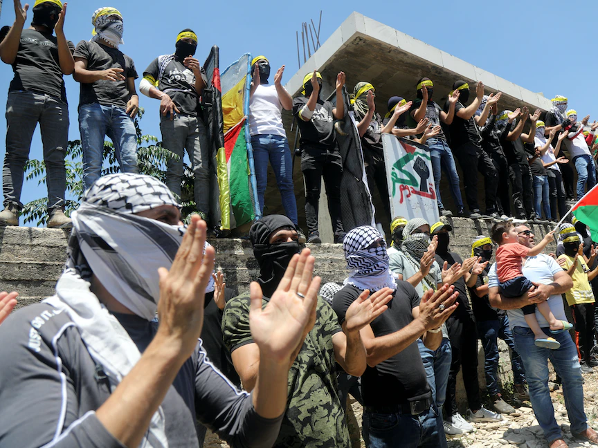 فلسطينيون يتظاهرون في الضفة الغربية ضد النشاط الاستيطاني الإسرائيلي - 1 يوليو 2022 - REUTERS