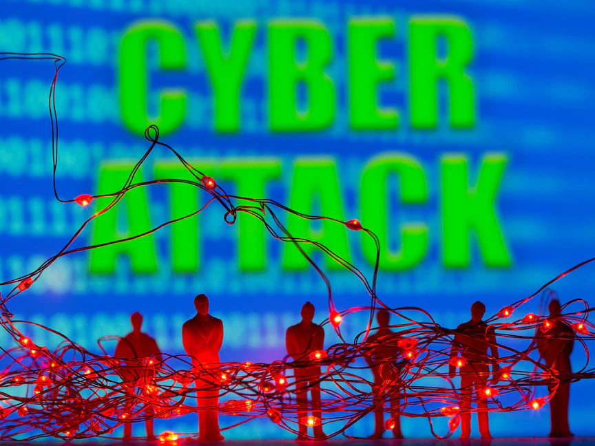 رسم تعبيري لهجوم سيبراني - 5 يوليو 2021 - REUTERS