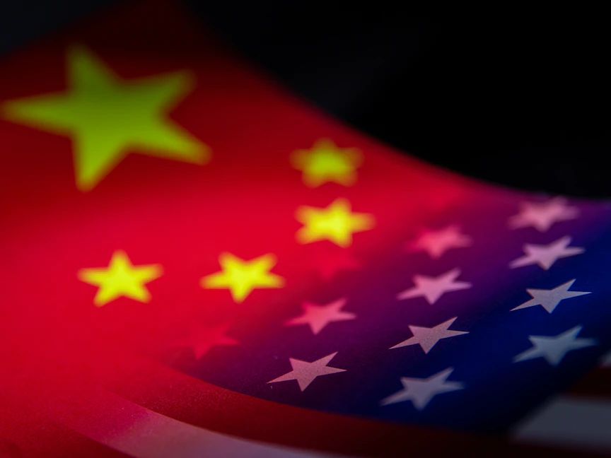 علما الصين والولايات المتحدة في رسم توضيحي- 27 يناير 2022 - REUTERS