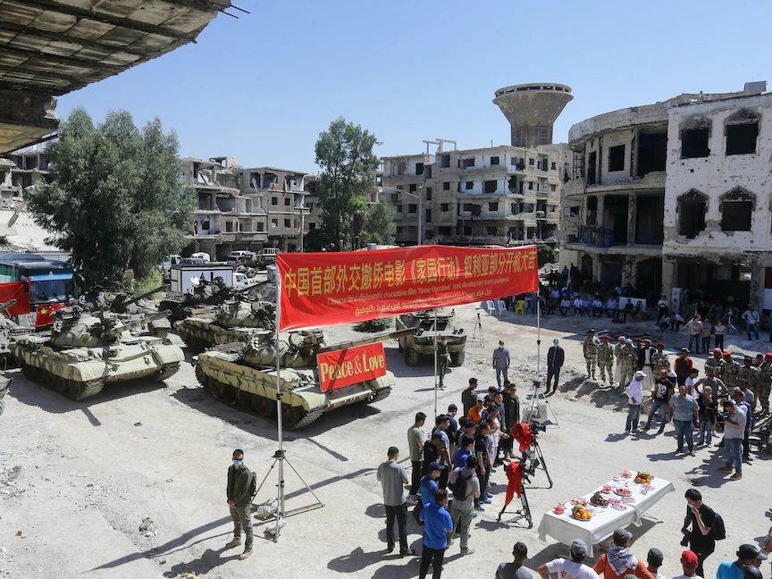 جانب من الاحتفال ببدء تصوير فيلم جاكي شان الجديد في سوريا - AFP