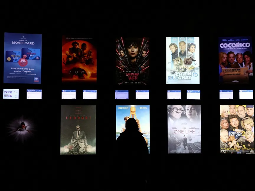 ملصقات إعلانية لأفلام في دار سينما كينيبوليس إيماجيبرين في براين لالود ببلجيكا. 5 مارس 2024 - Reuters