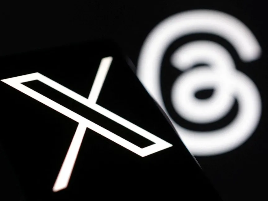 شعارا منصتي ثريدز وإكس للتواصل الاجتماعي - REUTERS