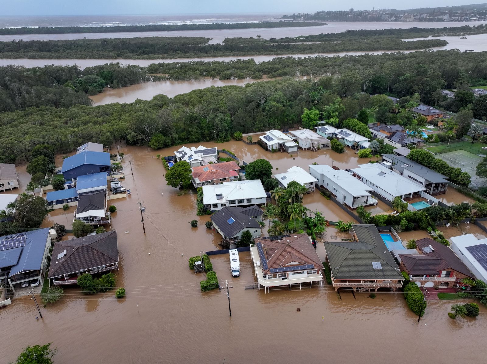A drone view of flooding around Settlement Point Road, in Port Macquarie, New South Wales, Australia, May 22, 2025. AAP/Lindsay Moller/via REUTERS    ATTENTION EDITORS - THIS IMAGE WAS PROVIDED BY A THIRD PARTY. NO RESALES. NO ARCHIVE. AUSTRALIA OUT. NEW ZEALAND OUT. NO COMMERCIAL OR EDITORIAL SALES IN NEW ZEALAND. NO COMMERCIAL OR EDITORIAL SALES IN AUSTRALIA.