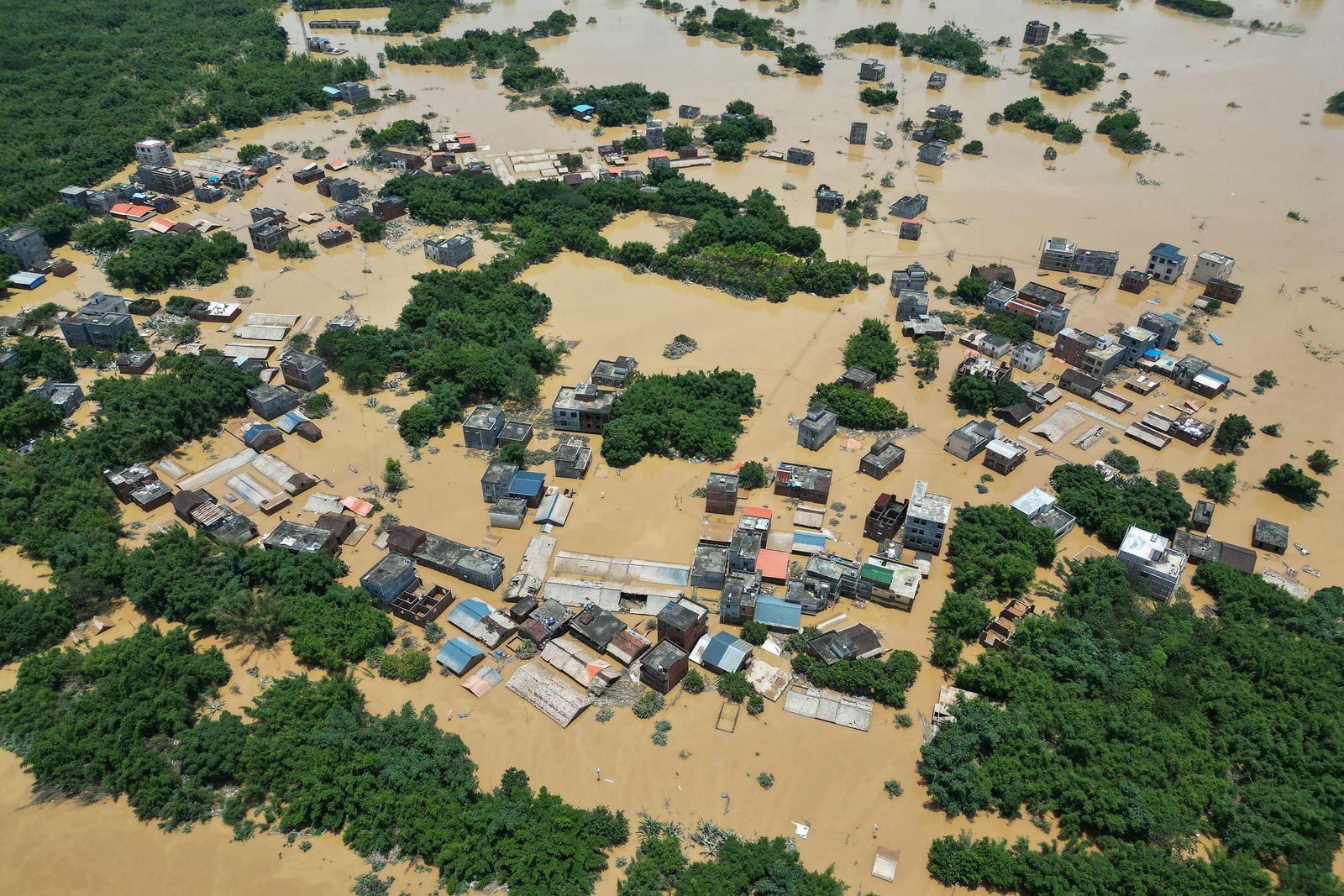 This aerial photo taken on June 23, 2022 shows a flooded area after heavy rains in Yingde, Qingyuan city, in China's southern Guangdong province. (Photo by AFP) / China OUT - AFP