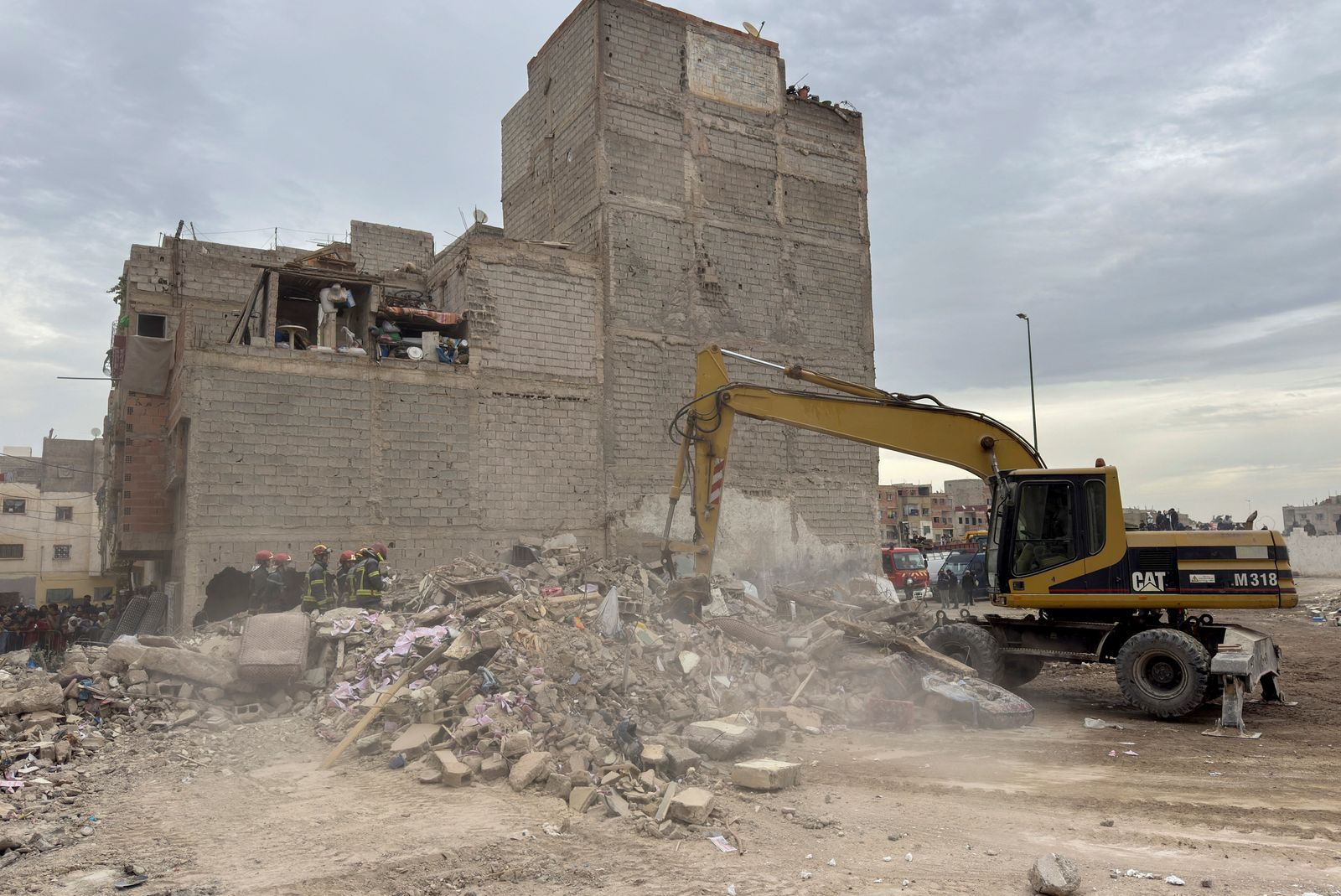 Rescuers work at the site of the collapse of two buildings in Fes, Morocco, December 10, 2025. REUTERS/Said Echarif
