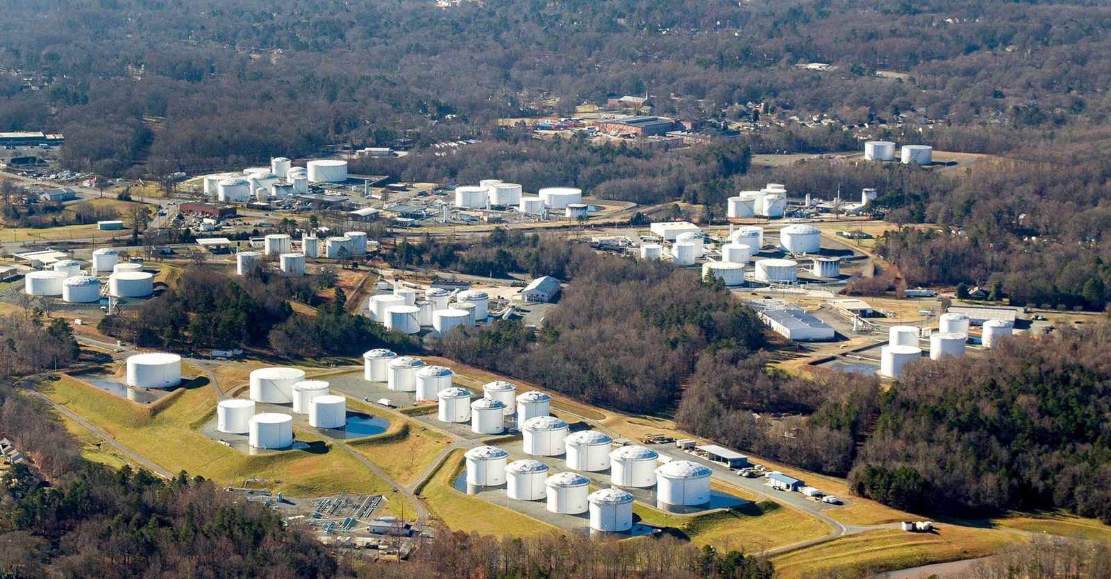 FILE PHOTO: Holding tanks are seen at a Colonial Pipeline facility in an undated photograph - via REUTERS