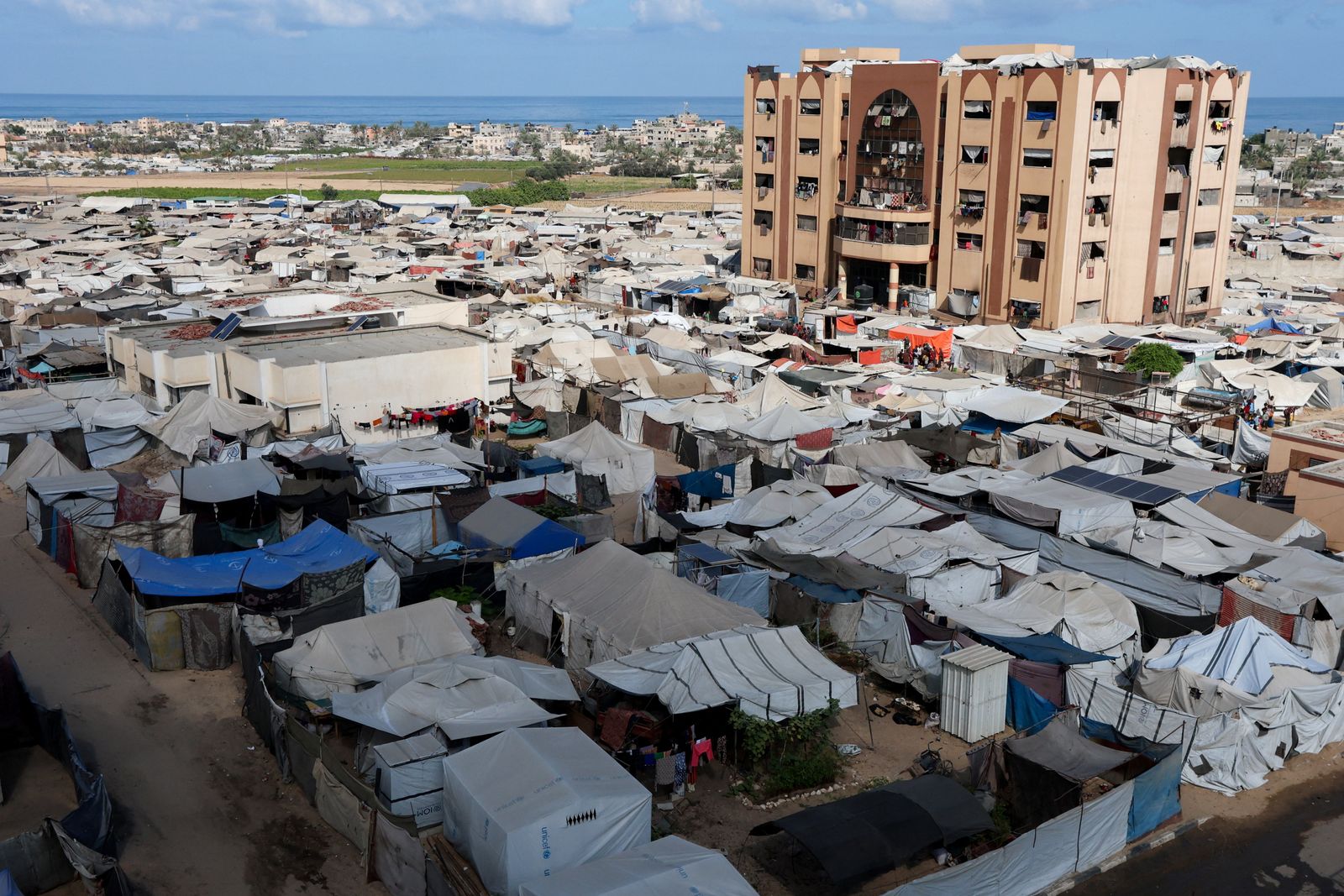 Displaced Palestinians shelter in a tent camp in Mawasi area, designated by Israel as a humanitarian zone, where aid agencies say basic services are inadequate for the large number of people living there, in Khan Younis in the southern Gaza Strip September 10, 2025. REUTERS/Ramadan Abed