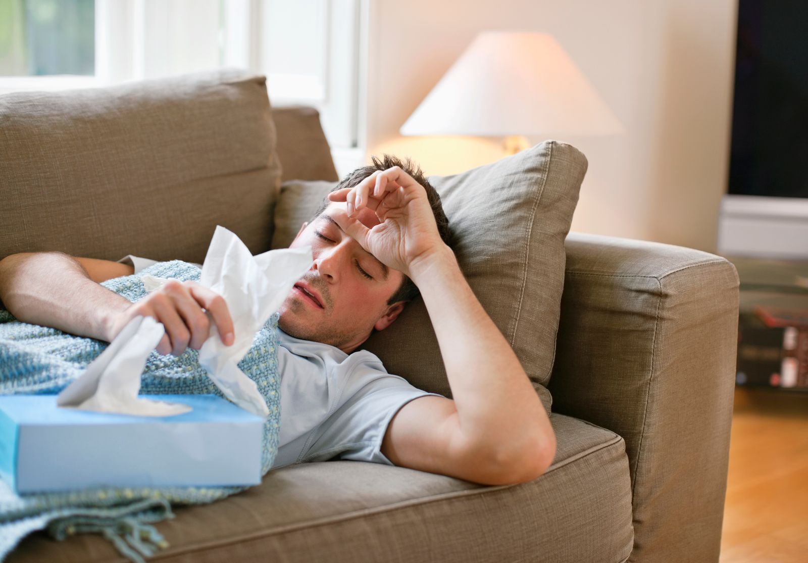 يصاب بعض الناس بآلام عضلية وحمى ليوم أو يومين بعد أخذ لقاح الإنفلونزا - Getty