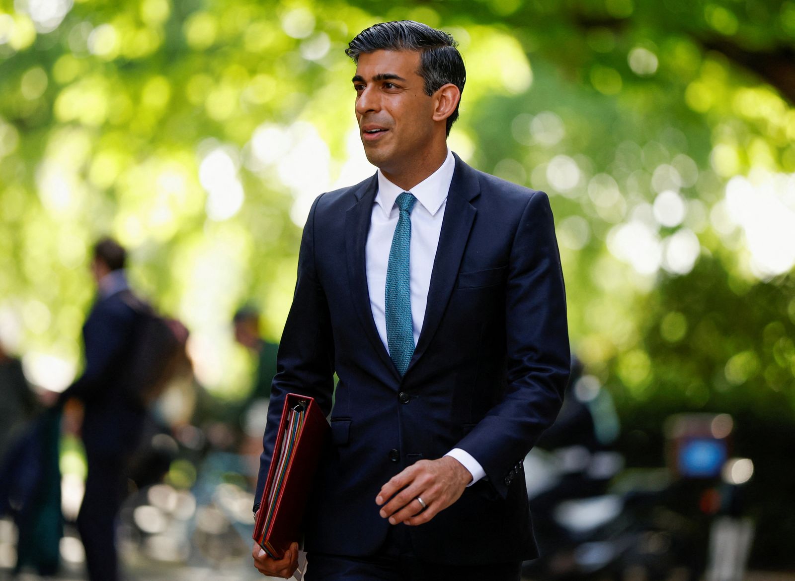 FILE PHOTO: British Chancellor of the Exchequer Rishi Sunak leaves Millbank Studios after a media interview in London, Britain, May 27, 2022. REUTERS/John Sibley/File Photo - REUTERS