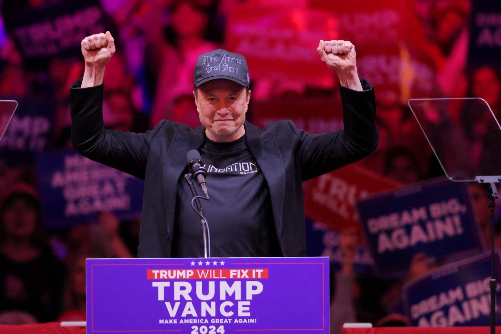 Tesla CEO and X owner Elon Musk gestures on stage during a rally for Republican presidential nominee and former U.S. President Donald Trump at Madison Square Garden, in New York, U.S., October 27, 2024. REUTERS/Andrew Kelly