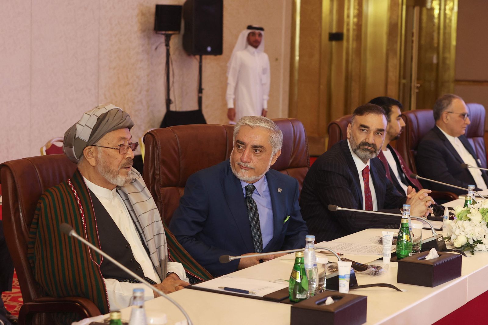 Afghanistan's former chief executive Abdullah Abdullah (2nd L) attends a session of the peace talks between the Afghan government and the Taliban in the Qatari capital Doha, on July 17, 2021. (Photo by KARIM JAAFAR / AFP) - AFP