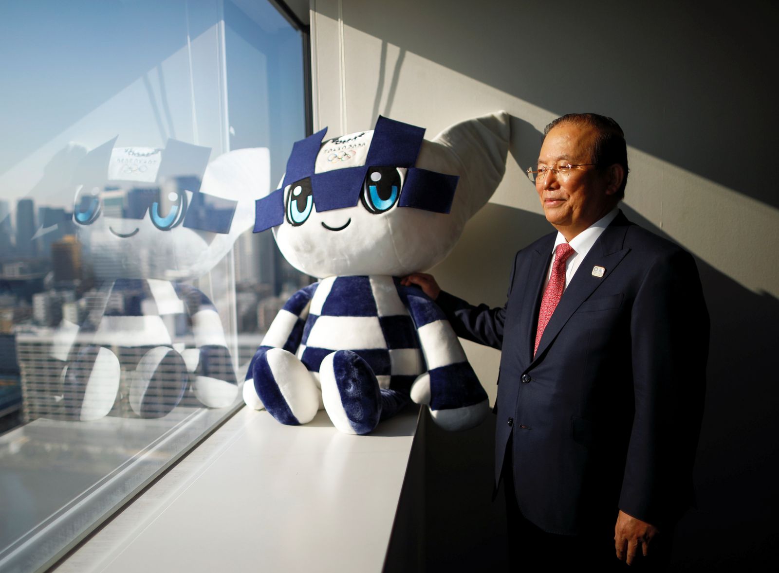 Toshiro Muto, Tokyo 2020 Organizing Committee CEO, poses for a photograph during an interview with Reuters in Tokyo - REUTERS
