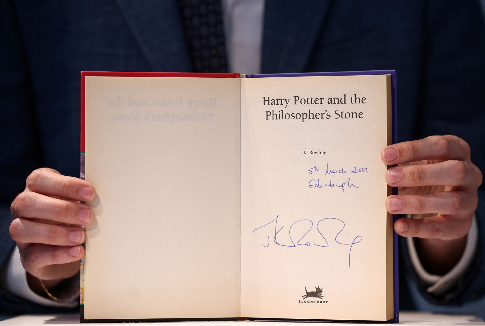 Rare first edition copy of 'Harry Potter and the Philosophers Stone' by British author J.K. Rowling at Christie's auction house in London - REUTERS