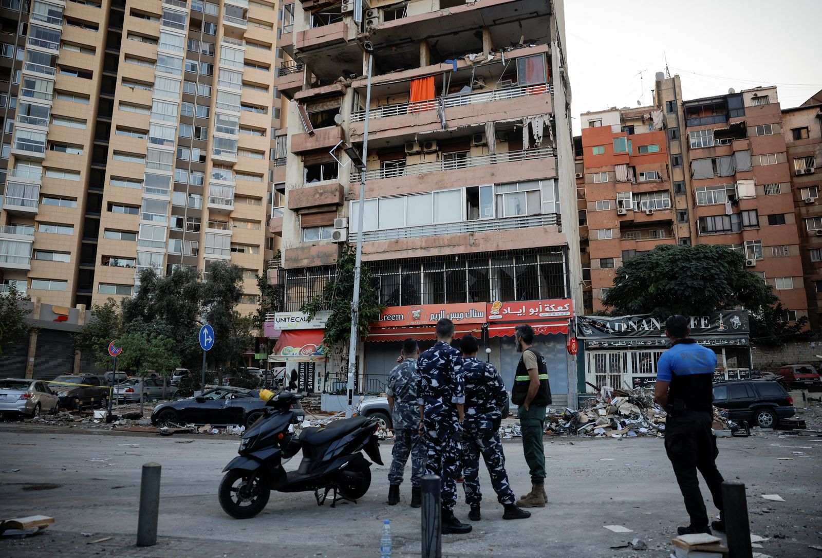 Police officers work at the site of an Israeli strike, amid ongoing cross-border hostilities between Hezbollah and Israeli forces, in Kola, central Beirut, Lebanon September 30, 2024. REUTERS/Louisa Gouliamaki