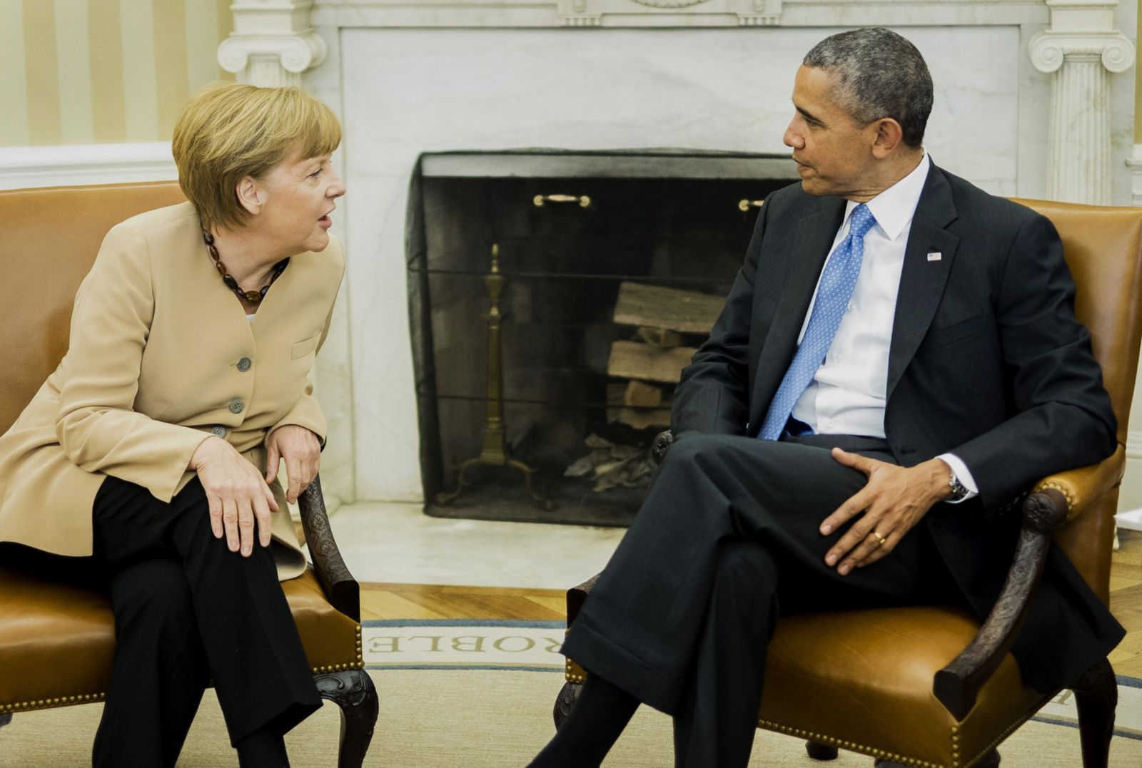الرئيس الأميركي باراك أوباما والمستشارة الألمانية أنغيلا ميركل خلال لقاء في البيت الأبيض - 2 مايو 2014 - Bloomberg