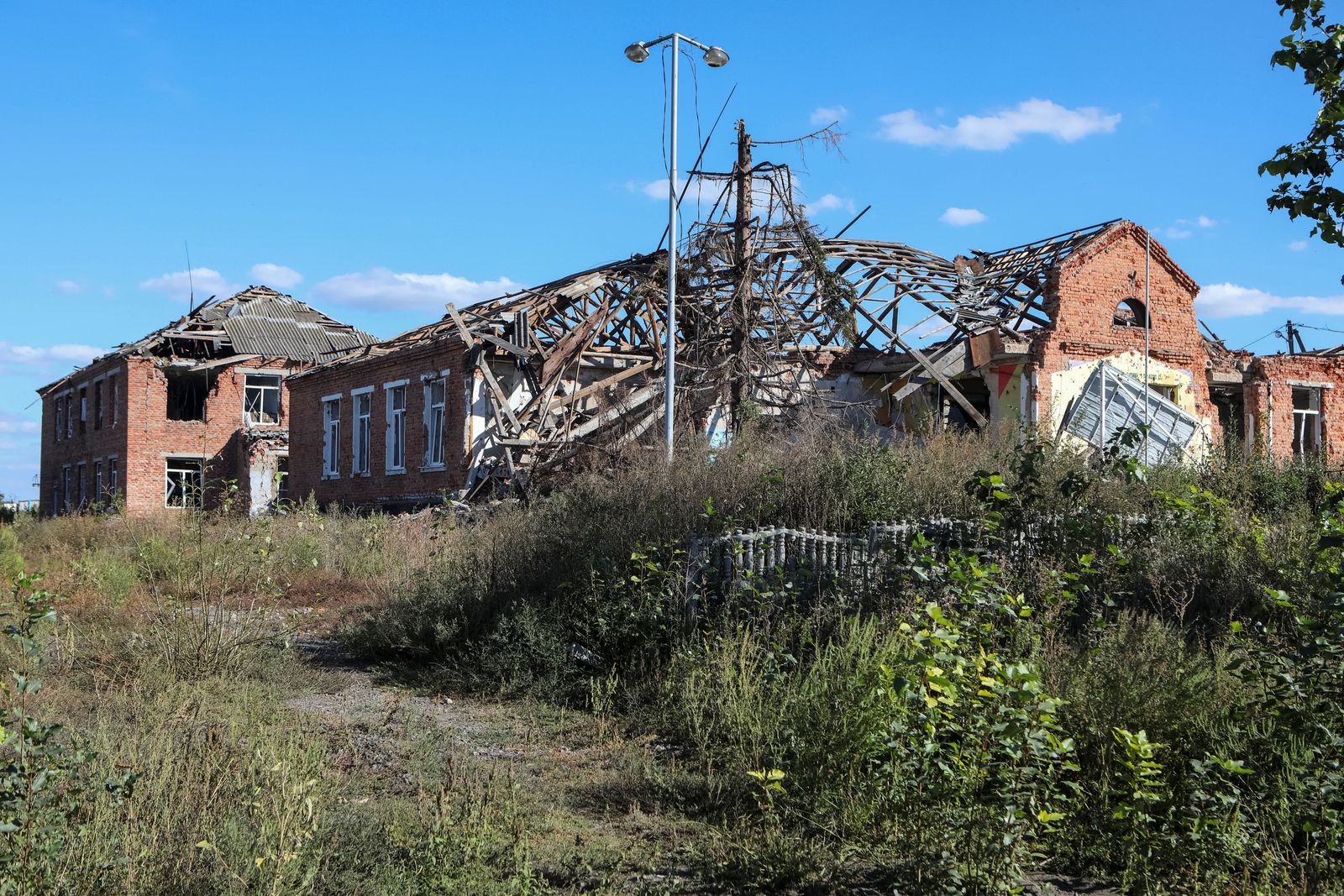 مباني متضررة في منطقة خاركيف الأوكرانية. 9 سبتمبر 2022 - REUTERS