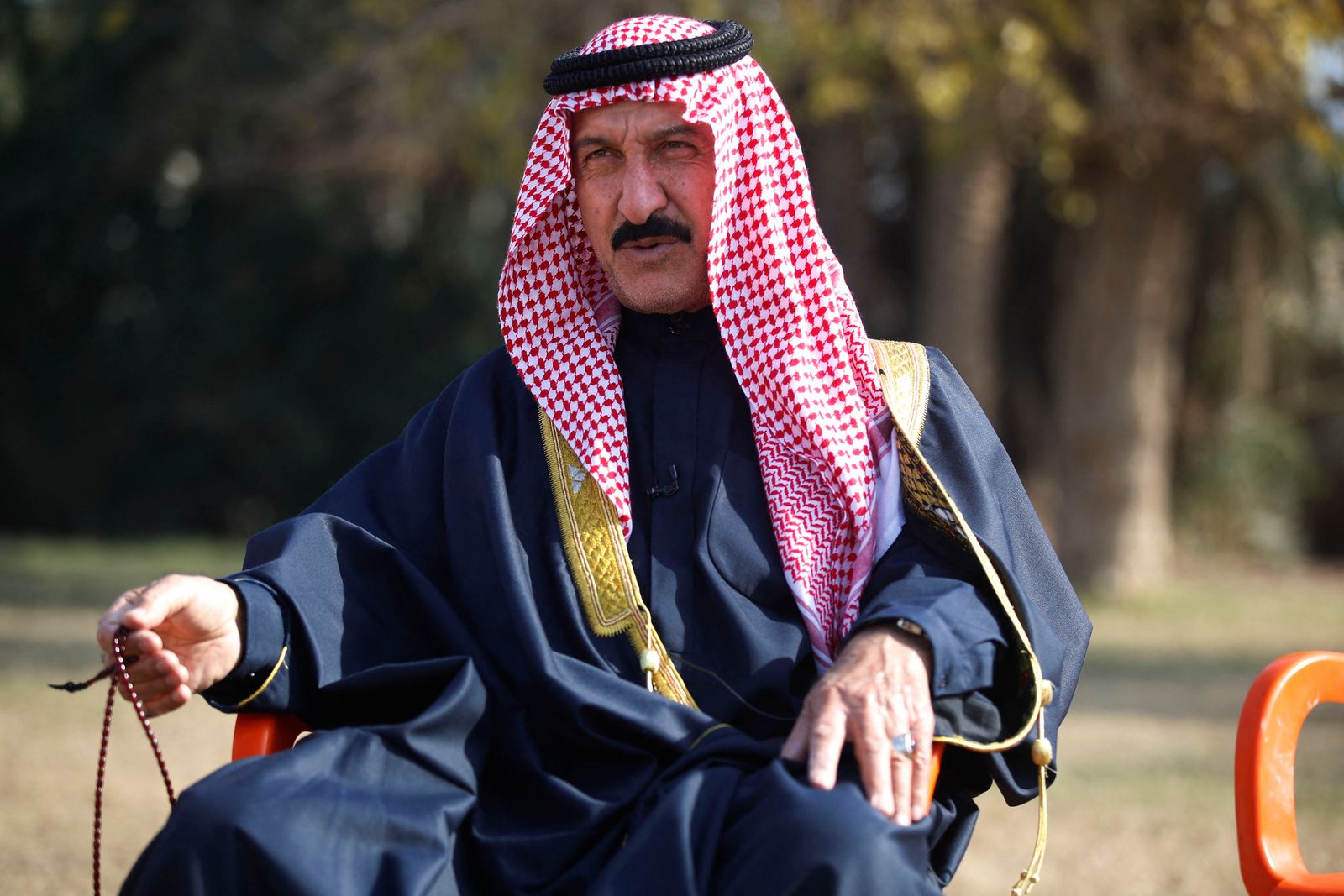 Sheikh Khalis Rashid, the local chief of the village of Albu Bali in the Dyala province northeast of the Iraqi capital Baghdad, speaks during an interview with AFP on January 12, 2023. - Iraq has come a long way since major fighting ended over five years ago against the Islamic State (IS) group, putting an end to the their self-declared 